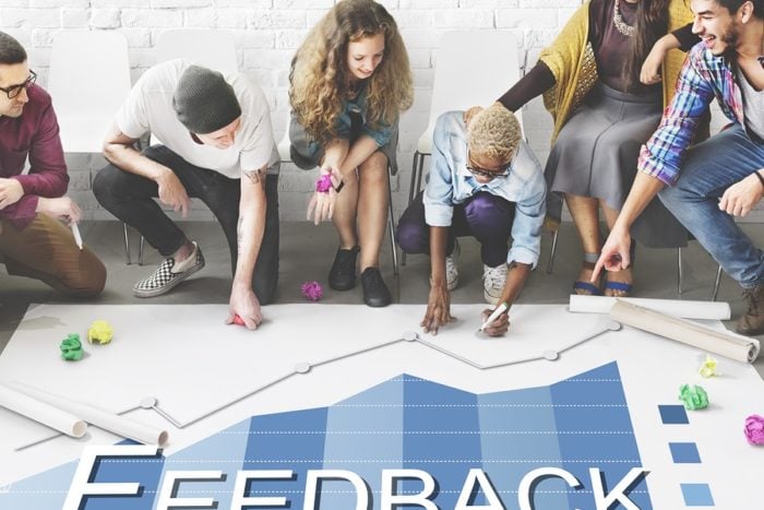 group of people drawing feedback illustration